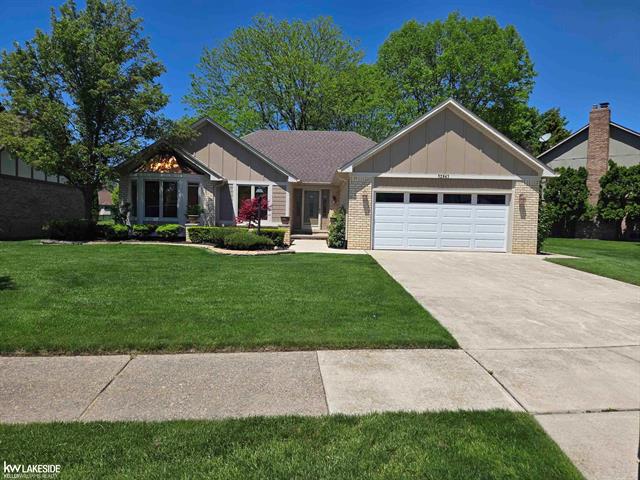 front view picture of 52843 Deerwood Dr, Macomb, MI. 48042