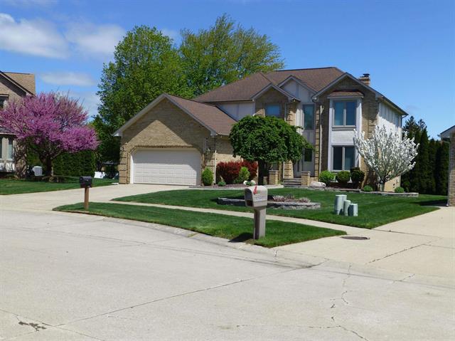 front view picture of 52572 Bordeaux Way, Utica, MI. 48315