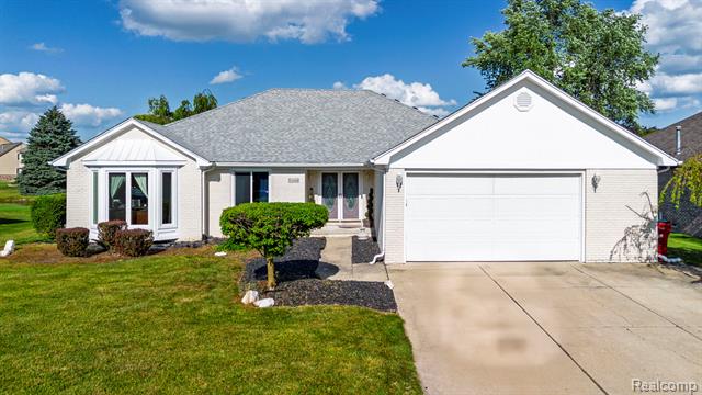 front view picture of 52448 Cedar Mill Dr, Macomb, MI. 48042