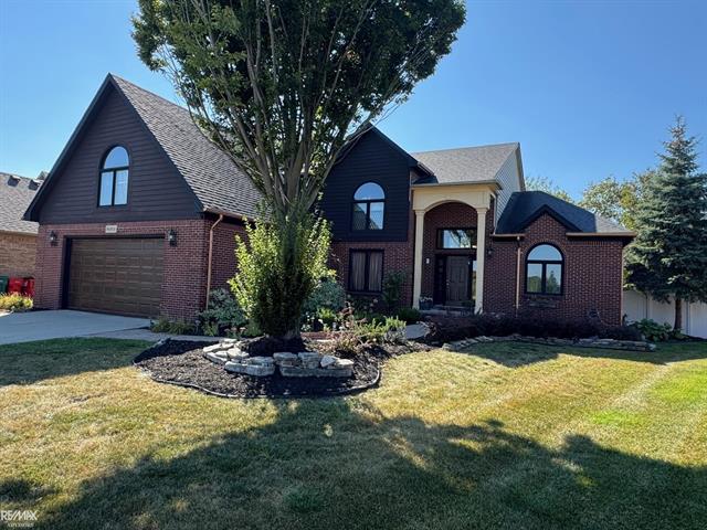 front view picture of 54353 Lily Dr, Macomb, MI. 48042