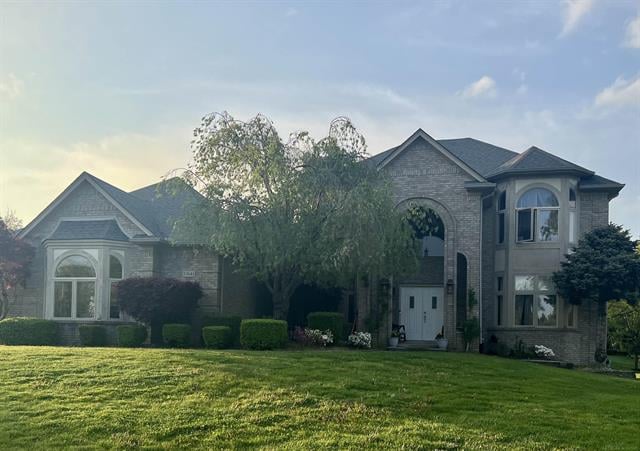 front view picture of 53641 Buckingham Ln, Shelby Township, MI. 48316