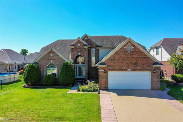 front view picture of 15892 Hyacinth Dr, Macomb, MI. 48042