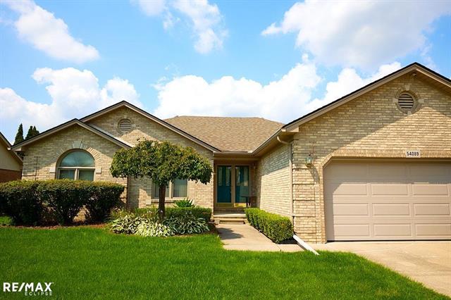 front view picture of 54089 Samara Dr, Macomb, MI. 48042