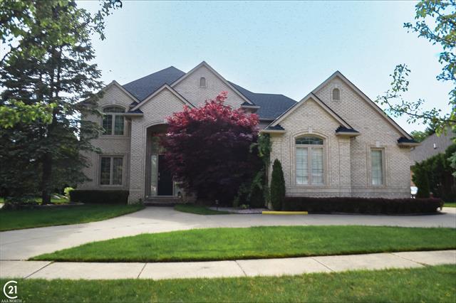 front view picture of 55397 Apple Ln, Shelby Township, MI. 48316