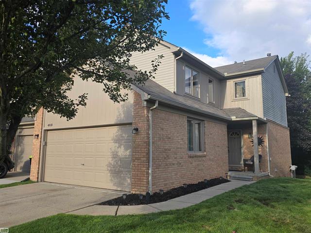 front view picture of 4910 Royal Cove, Shelby Township, MI. 48316