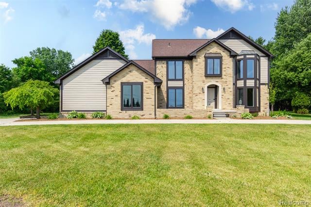 front view picture of 56259 Schoenherr Rd, Utica, MI. 48315