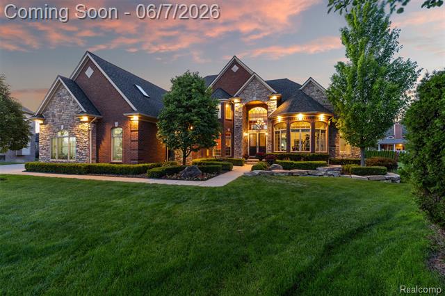 front view picture of 56074 Lario Ct, Macomb, MI. 48042