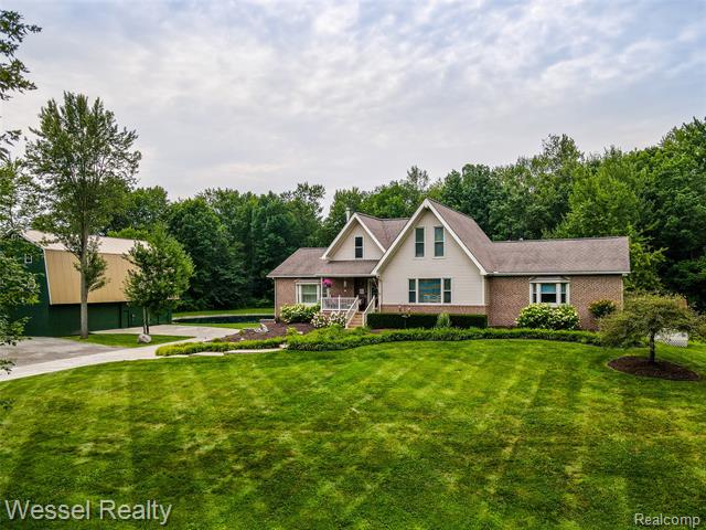 front view picture of 61615 Cetnor Court, Washington, MI. 48094