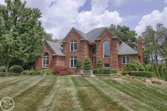 front view picture of 63100 Indian Hills Dr, Washington, MI. 48095