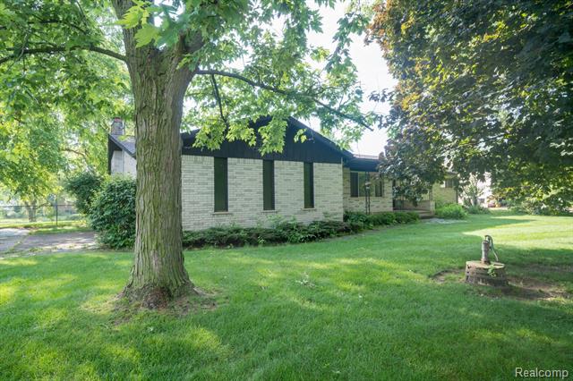 front view picture of 60938 Lake Edge, Washington, MI. 48094