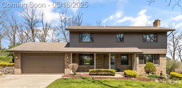 front view picture of 7533 Roberta Lane, Washington, MI. 48094