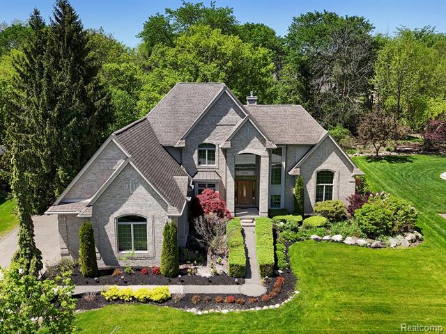 front view picture of 62887 Tournament Dr, Washington, MI. 48094