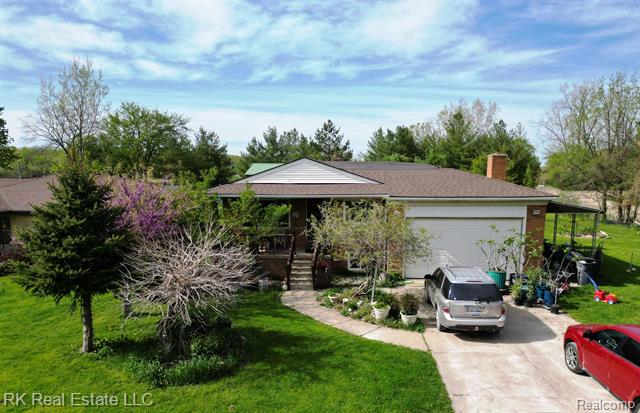 front view picture of 13799 31 Mile, Washington, MI. 48095