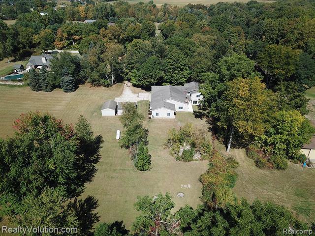 front view picture of 14750 Reid Road, Romeo, MI. 48065