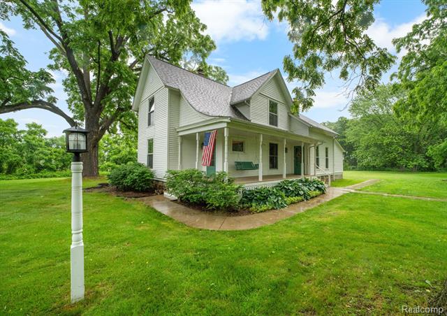 front view picture of 70080 Mc Vicar Road, Romeo, MI. 48065