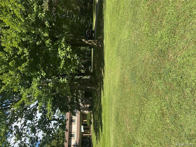 front view picture of 8911 Gates Street, Romeo, MI. 48065
