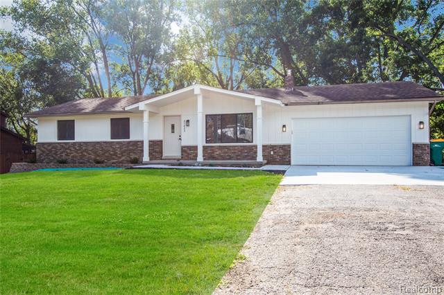 front view picture of 21423 Gill Rd, Farmington, MI. 48335