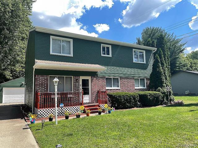 front view picture of 21456 Flanders St, Farmington, MI. 48335