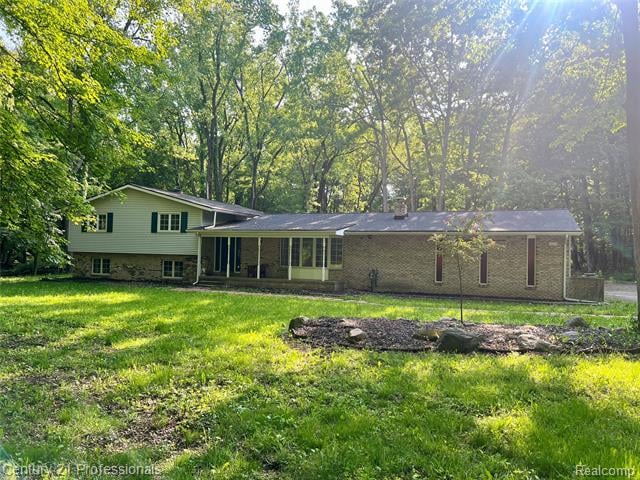 front view picture of 47993 W 9 Mile Rd, Northville, MI. 48167
