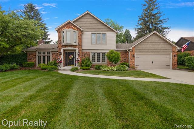 front view picture of 37566 Meadowhill Dr E, Farmington, MI. 48334
