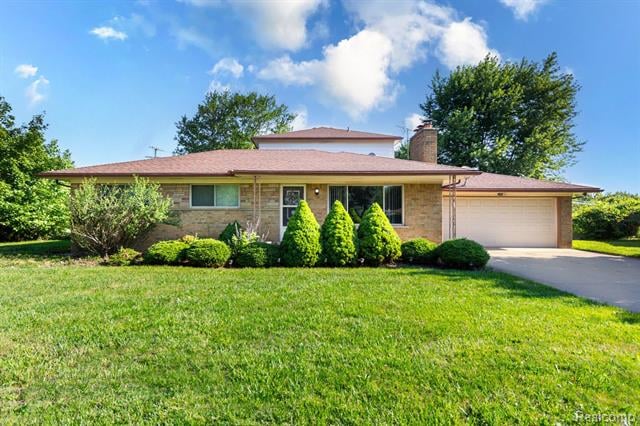 front view picture of 8345 14 Mile Rd, Sterling Heights, MI. 48312