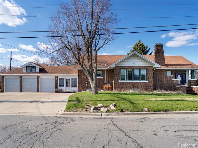 front view picture of 33815 Utica Rd, Fraser, MI. 48026