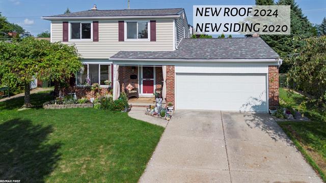 front view picture of 34308 Greentrees Roa, Sterling Heights, MI. 48312
