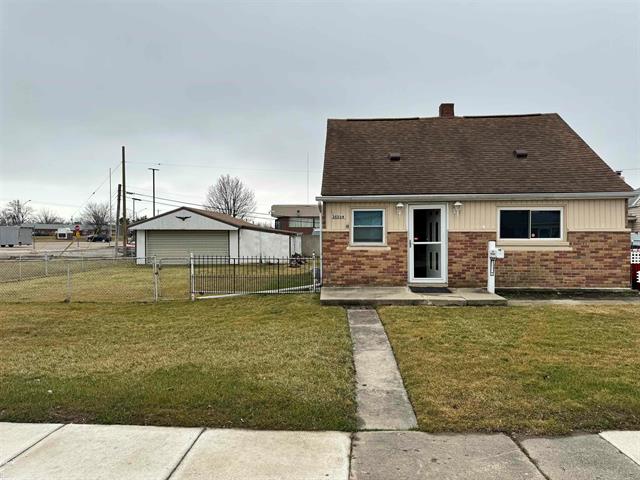 front view picture of 21228 Woodward, Clinton Township, MI. 48035