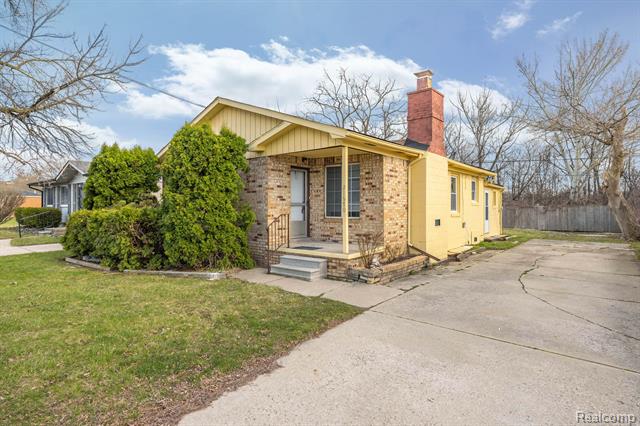 front view picture of 21670 Sharkey, Clinton Township, MI. 48035