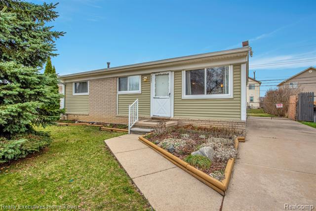 front view picture of 21841 Sharkey, Clinton Township, MI. 48035