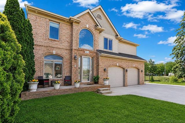 front view picture of 38035 Pointe Rosa, Harrison Township, MI. 48045