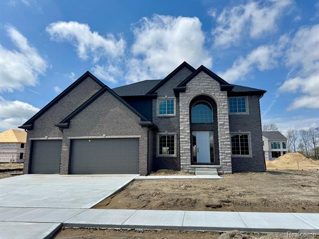 front view picture of 50437 Plaza Dr, Macomb, MI. 48042