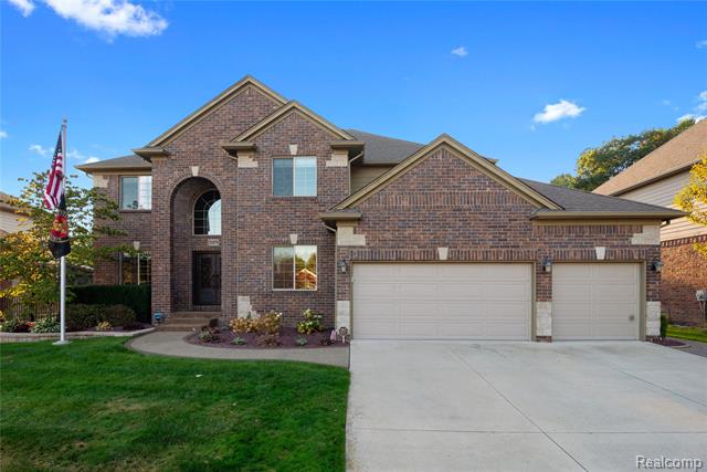 front view picture of 51879 Mauro Dr, Macomb, MI. 48042