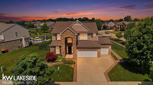 front view picture of 21965 Bellewood Dr, Macomb, MI. 48044
