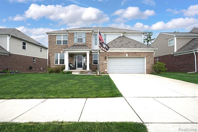 front view picture of 49378 Camarosa Ln, Macomb, MI. 48044