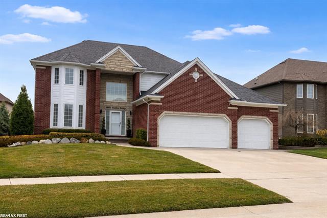 front view picture of 18011 Humber Bridge Dr, Macomb, MI. 48042