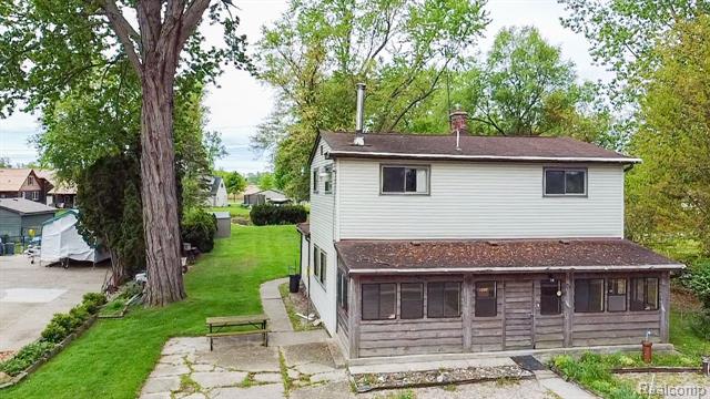 front view picture of 1397 North Channel Dr, Harsens Island, MI. 48028