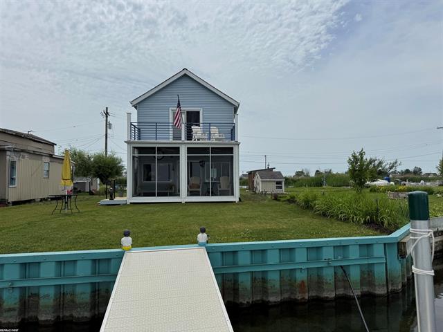 front view picture of 7286 South Channel Dr, Harsens Island, MI. 48028