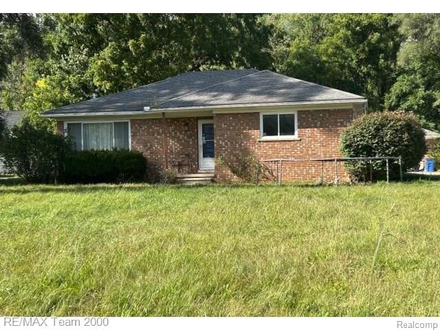 front view picture of 32652 Cadillac St, Farmington, MI. 48336