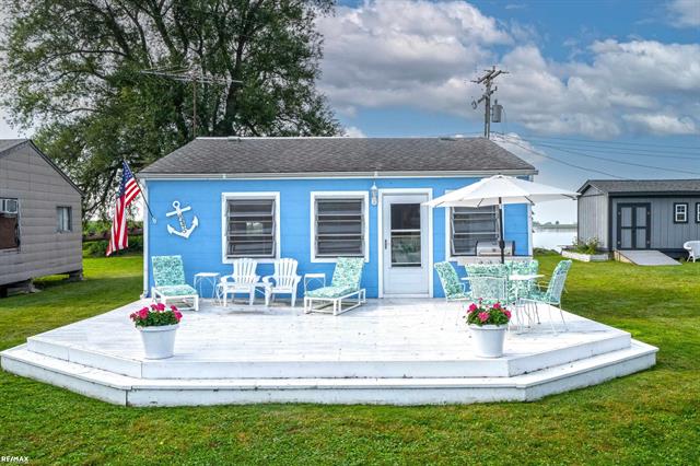 front view picture of 8445 Big Fisher Hwy, Harsens Island, MI. 48028