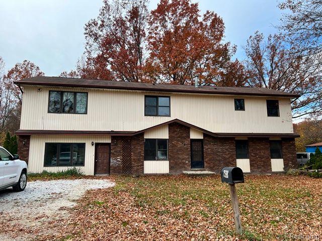 front view picture of 7598 Lake Park Dr, Fair Haven, MI. 48023
