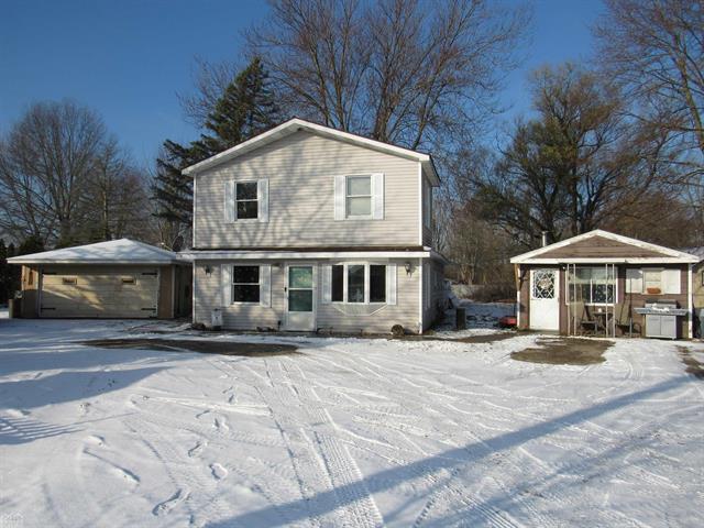 front view picture of 7640 River Rd, Marine City, MI. 48039