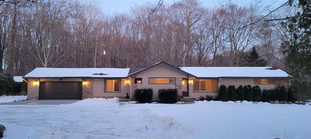 front view picture of 4265 County Line Rd, Casco, MI. 48064