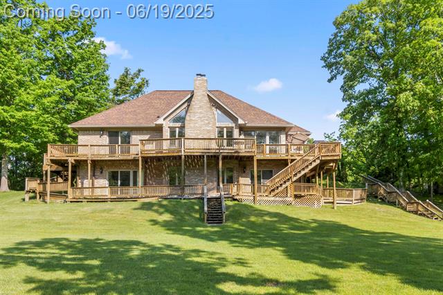 front view picture of 6767 Puttygut Rd, East China, MI. 48054