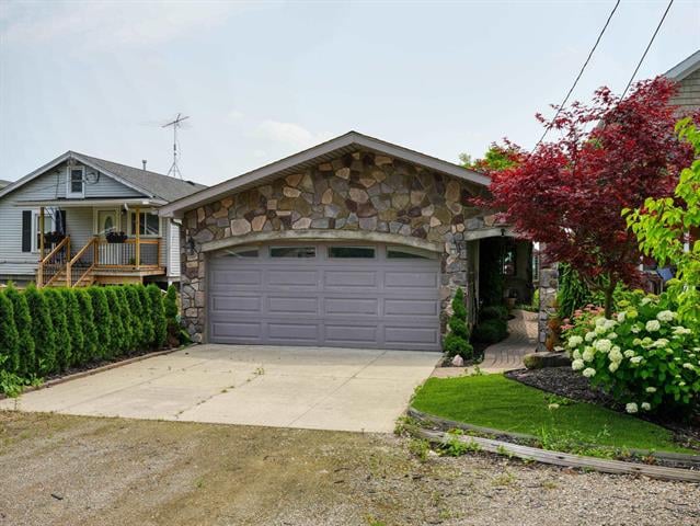 front view picture of 5403 Pointe Dr, East China, MI. 48054
