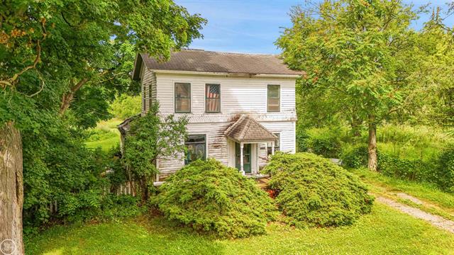 front view picture of 81749 Main St, Memphis, MI. 48041
