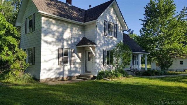 front view picture of 8980 Yager Rd, Goodells, MI. 48027