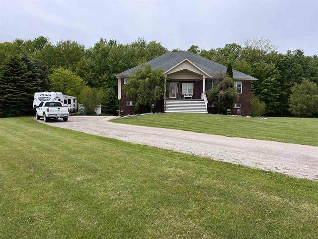 front view picture of 815 Cove Rd, Goodells, MI. 48027