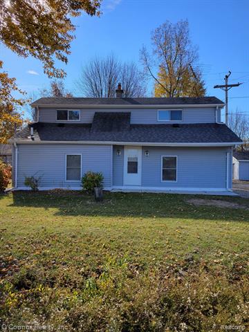 front view picture of 6801 Ravenswood Rd, Smiths Creek, MI. 48074