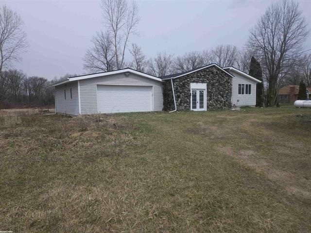 front view picture of 9202 Lambs Rd, Goodells, MI. 48027